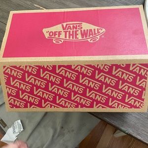 Vans sneakers size 8.5 brand new never worn still in the box. Black and white